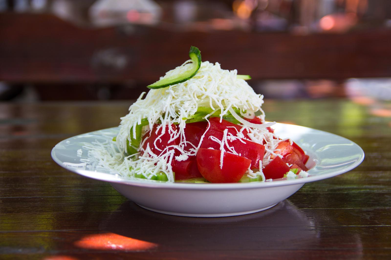 Shopska salad on cafe table