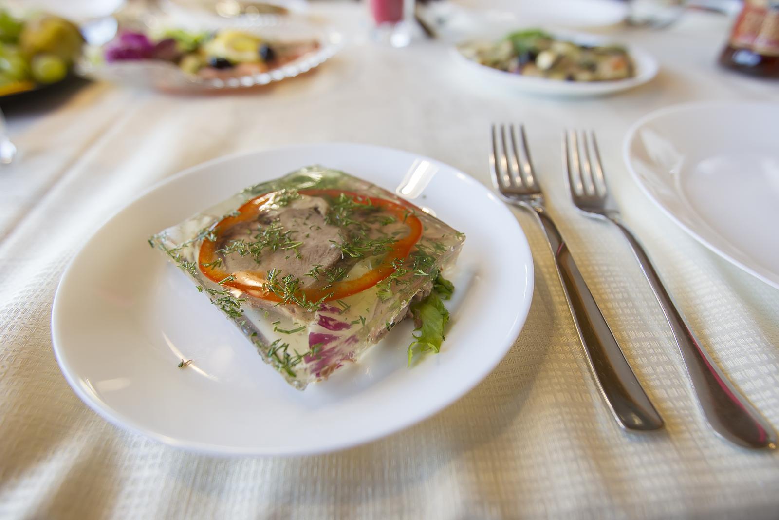 Aspic meat on a plate. Beef jelly. Russian food aspic